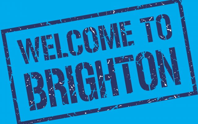 text styled to look like a rubber stamp, reading 'Welcome to Brighton'